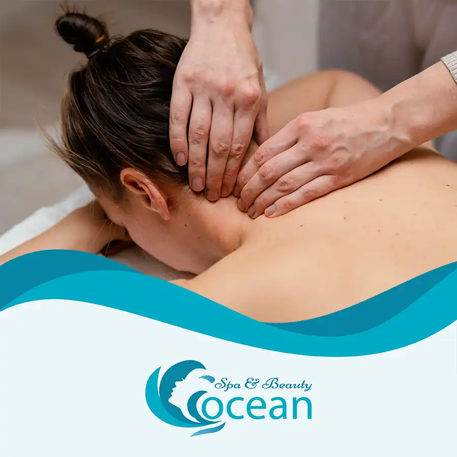 Therapist providing a targeted back, neck, and shoulder massage to relieve muscle tension at Ocean Spa Hoi An