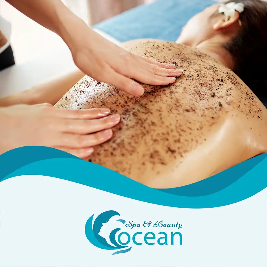 Natural Body Scrub & Wrap in Hoi An: Skin Detox Spa therapist applying a natural coffee body scrub to a client in a private room at Ocean Spa Hoi An